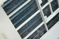dust stuck in the back of the air conditioner