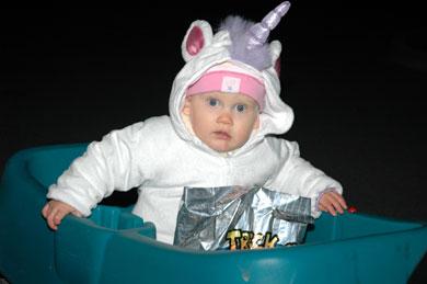 child dressed as a Unicorn for Trick or Treating