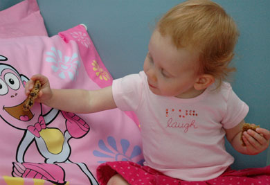 Julia Feeding Boots a Cookie