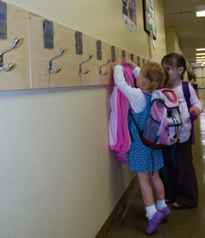 Julia Hanging Her Coat