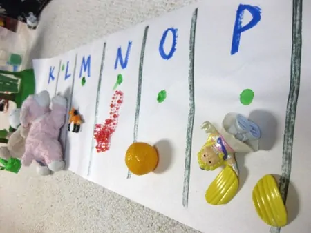 Homemade ABC hunt game with alphabet letters to promote early literacy