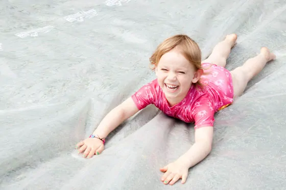 Wordless Wednesday — Olivia Rocks the Slip N Slide