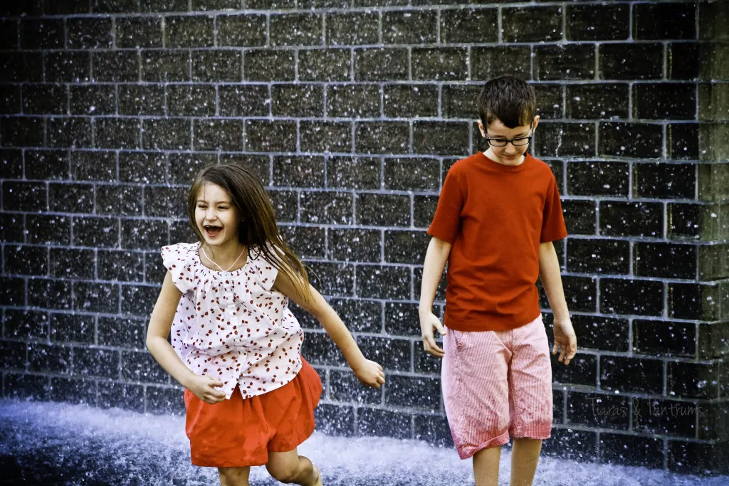 boy and girl playing outside