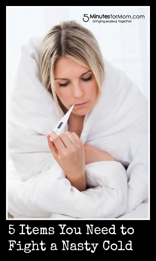 Ill woman with thermometer In mouth