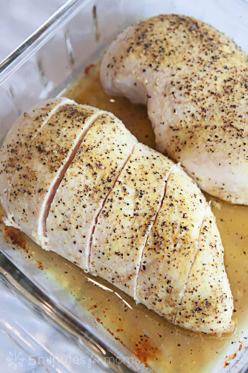 lemon pepper chicken in glass baking pan