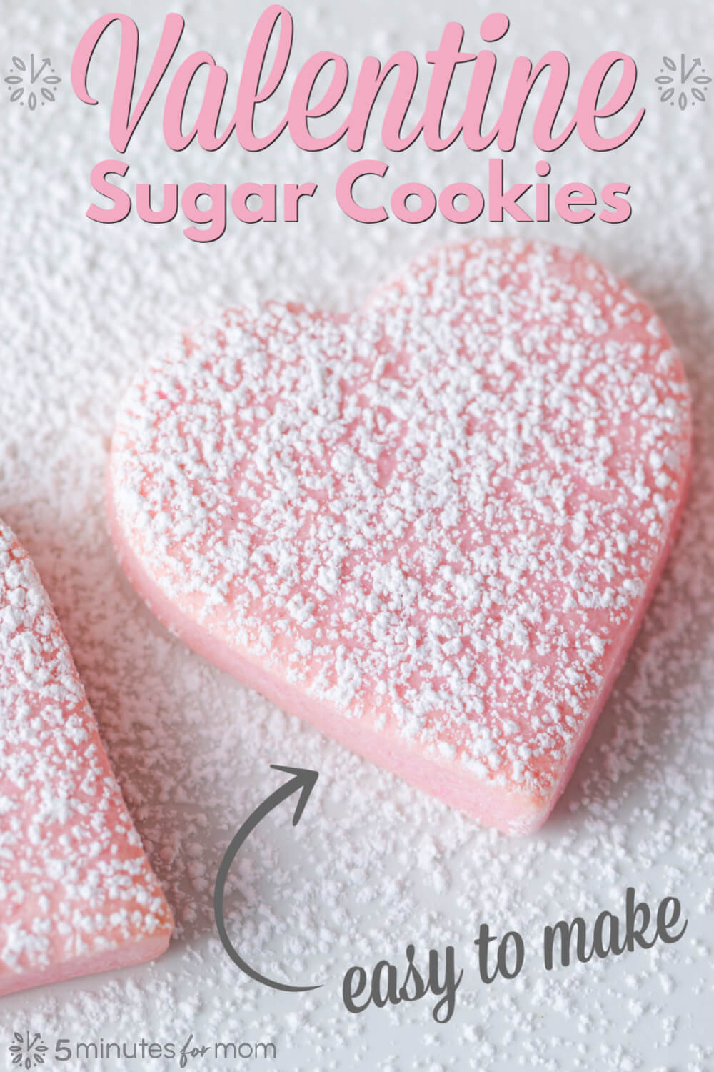 Valentine sugar cookies made with pink cookie dough, cut into heart shapes, and sprinkled with powdered sugar. Text overlay says Valentine Sugar Cookies - Easy To Make