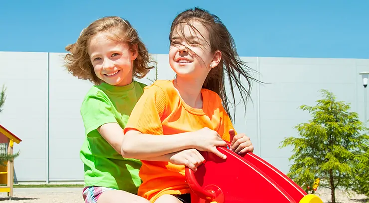 Happy kids playing outdoors