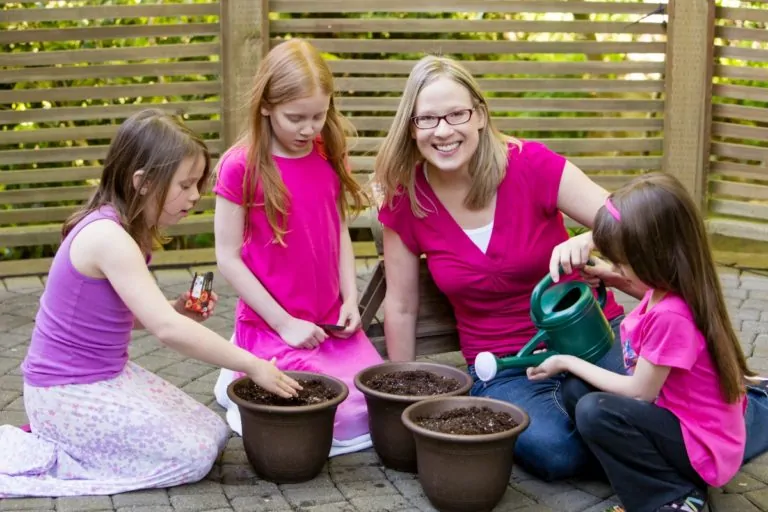 Gardening with Kids - Help your kids reconnect with real food by planting a few seeds and watching them grow.