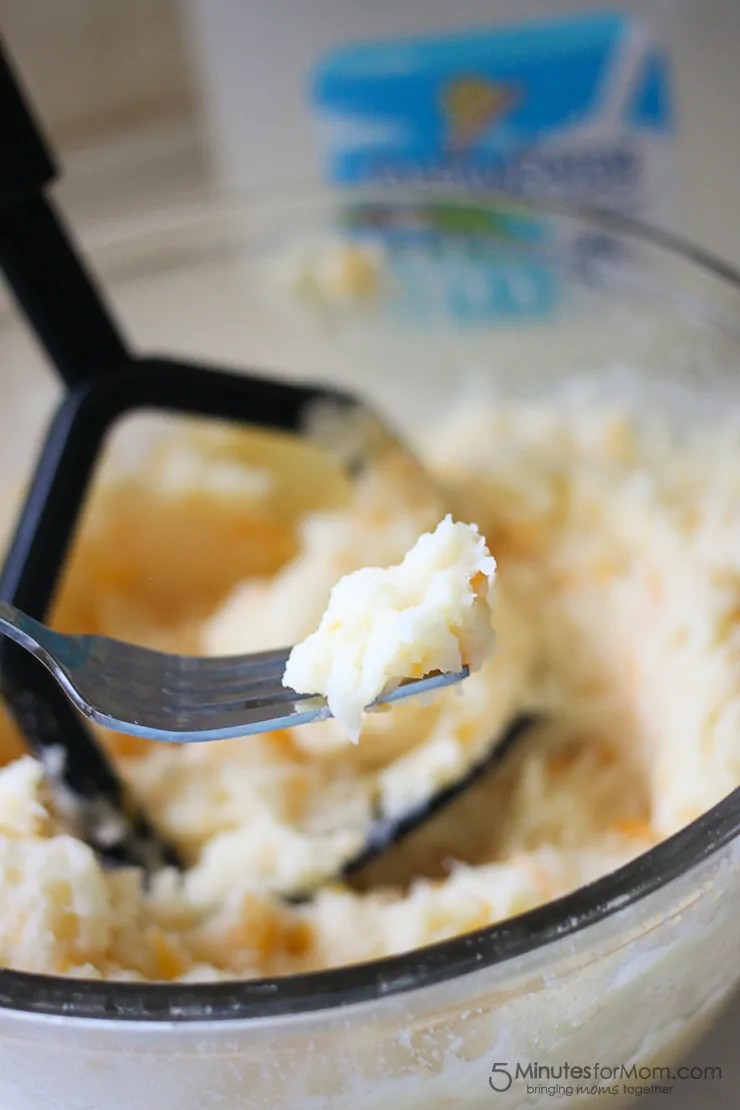 Creamy Four Cheese Mashed Potatoes make the perfect side dish to a grilled steak or southern fried chicken!