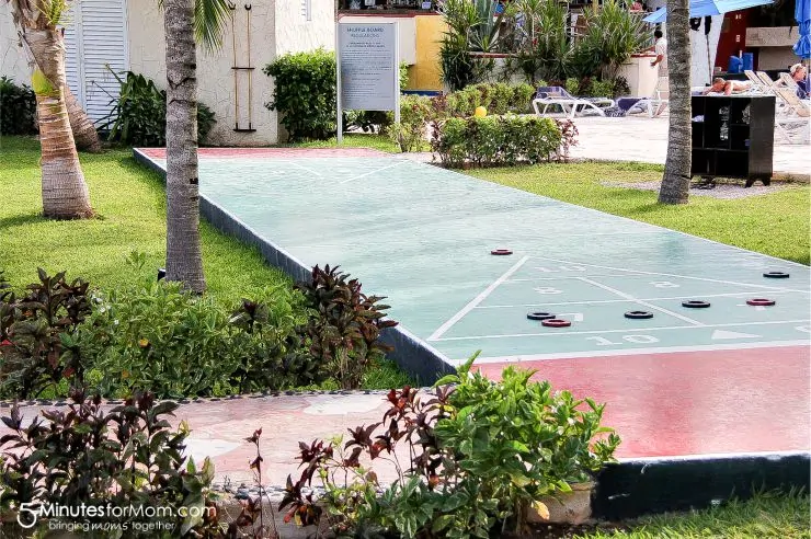 Play shuffle board at Azul Sensatori Hotel Cancun