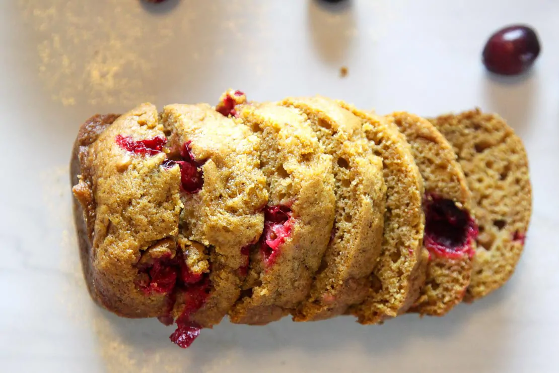 Cranberry Pumpkin Bread Recipe, perfect for a dinner party, Thanksgiving, or Christmas morning!