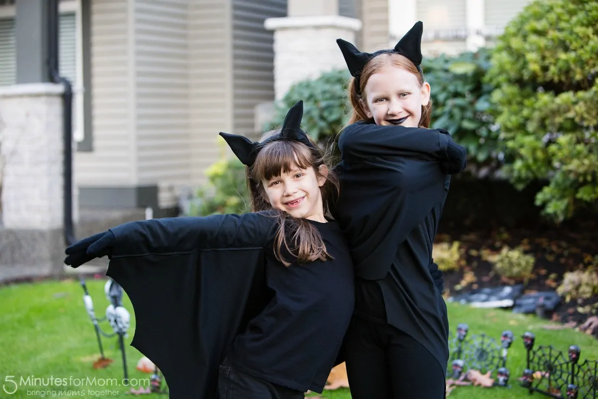 Julia and Sophia bat costumes trick or treating