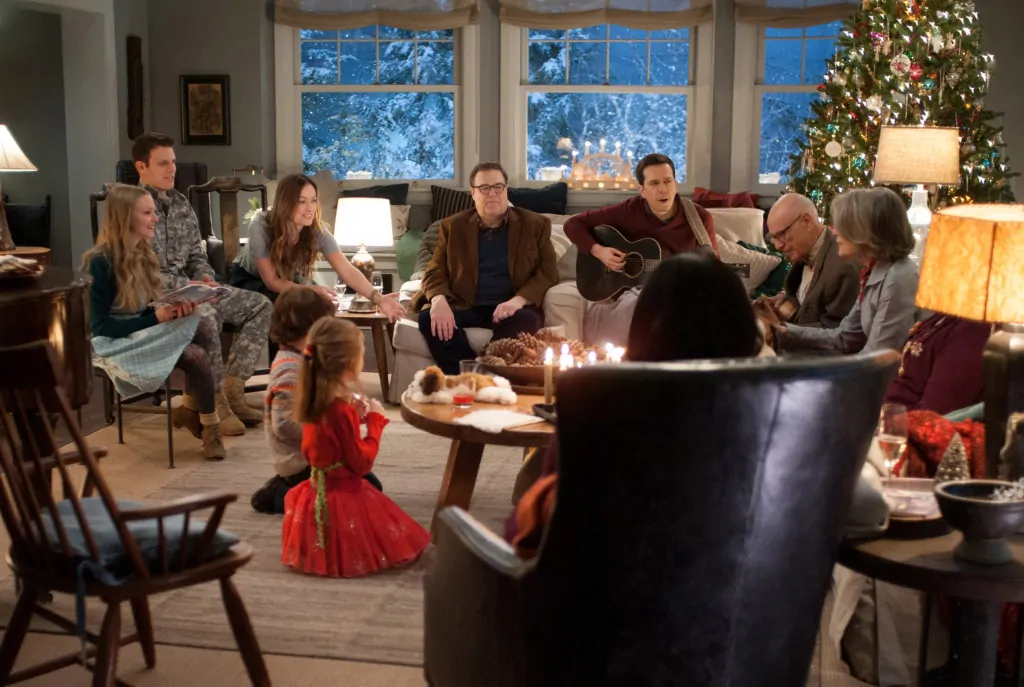 (Left to right) Amanda Seyfried, Jake Lacy, Olivia Wilde, Maxwell Simkins, Blake Baumgartner, John Goodman, Ed Helms, Alan Arkin, Diane Keaton and Alex Borstein (back to camera) in LOVE THE COOPERS to be released by CBS Films and Lionsgate.