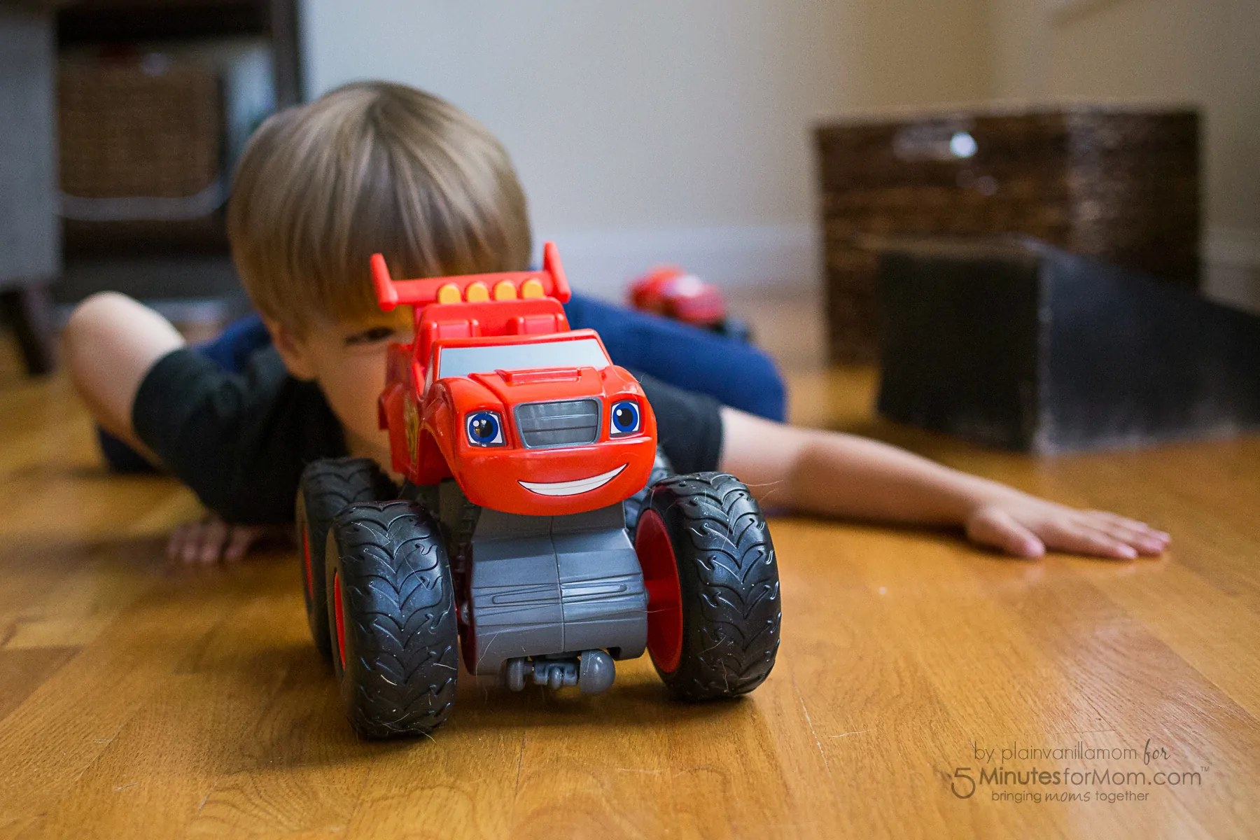 child playing with super stunts blaze