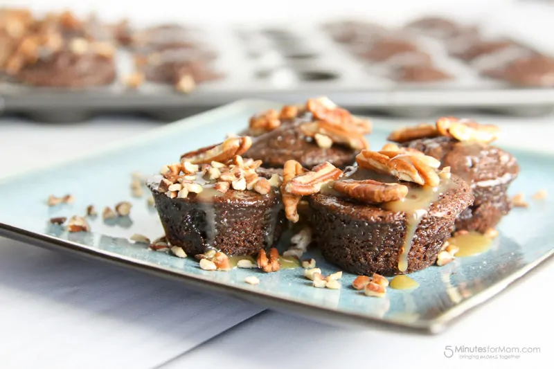 Chocolate fudge brownies, caramel, and pecans are the stars of this show. These brownies are ooey gooey and sticky!