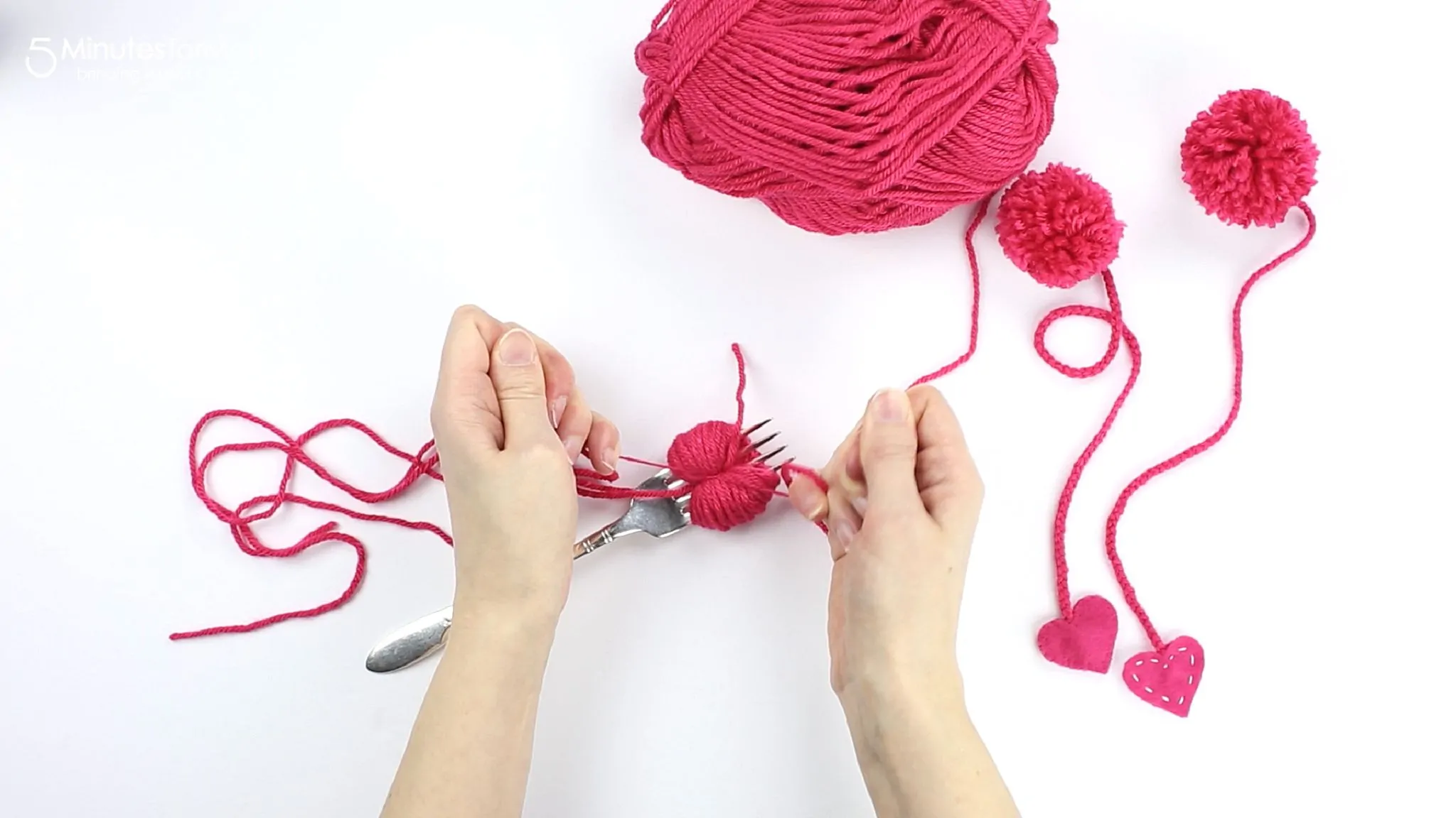 tie a knot around the ball of yarn