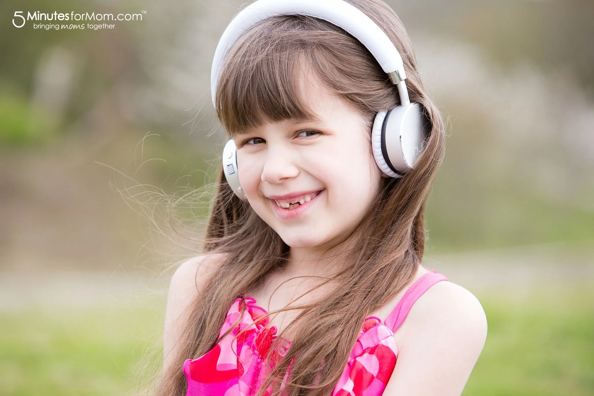 Sophia Wearing Puro Sound Labs Headphones