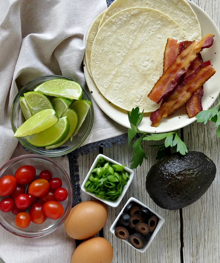 Avocado and Bacon Breakfast Tacos. These breakfast tacos are quick and easy delicious and loaded with protein!