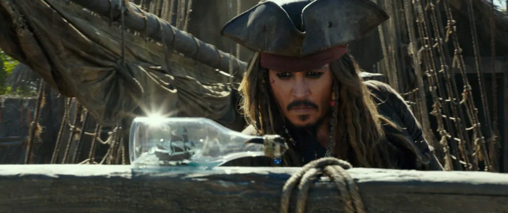 Jack Sparrow (Johnny Depp) with the Black Pearl in a bottle - Pirates of the Caribbean: Dead Men Tell No Tales