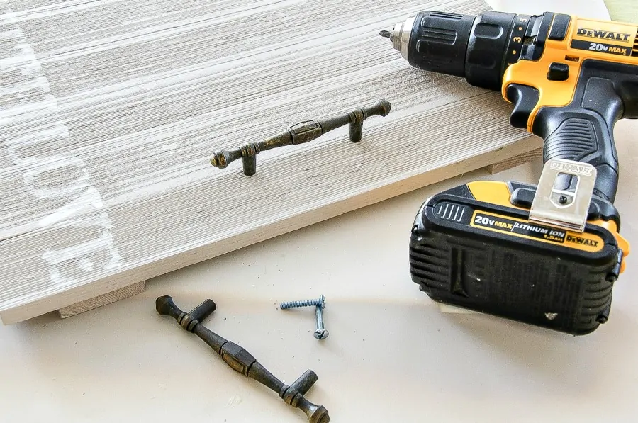 Add drawer handles to the handmade tray