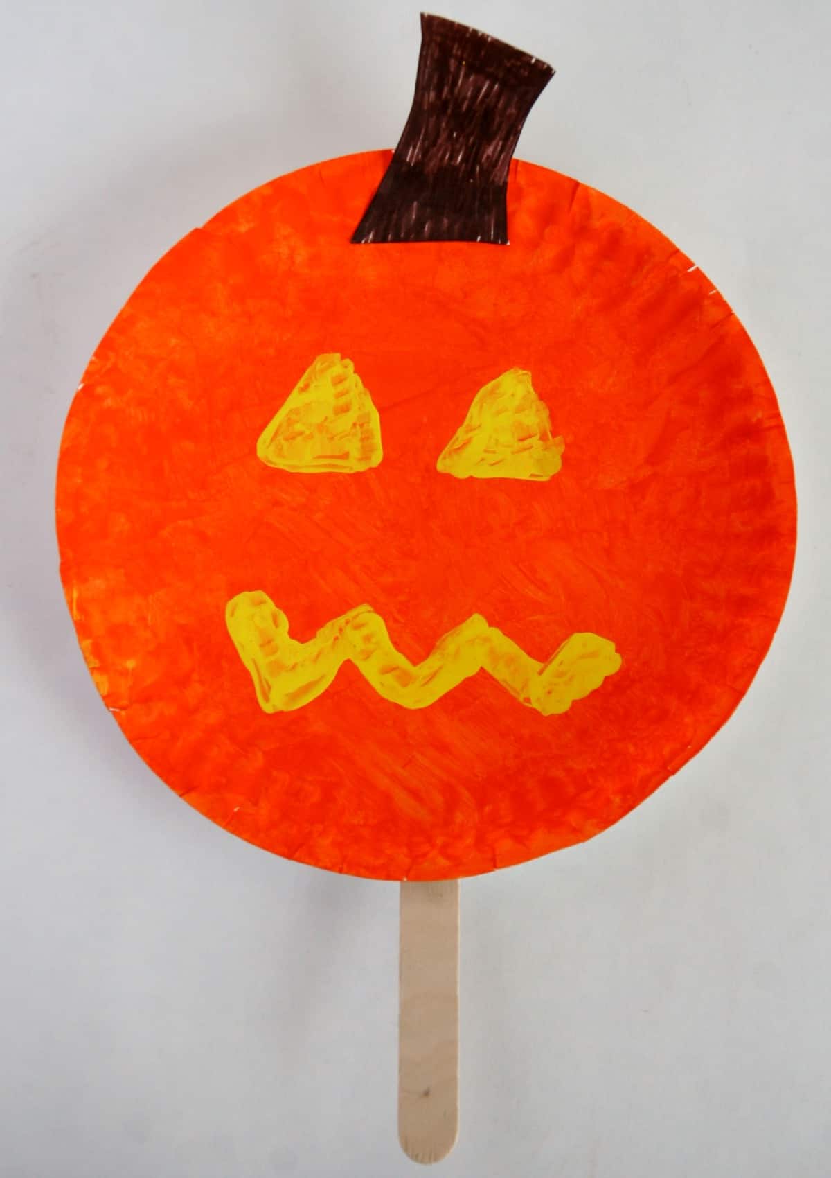 Pumpkin Paper Plate Halloween Stick Puppet