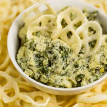 Vegan Spinach and Artichoke Dip with Spokes Air-Puffed Potato Snacks