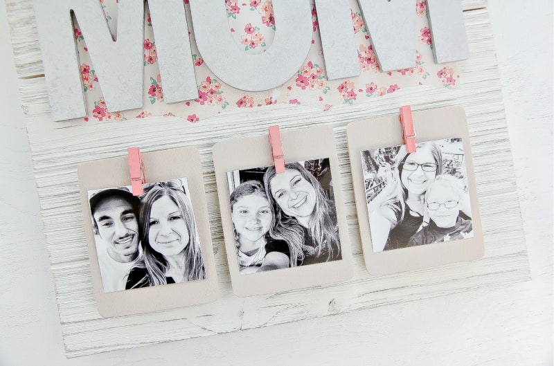 Attach photos to the pallet picture frame