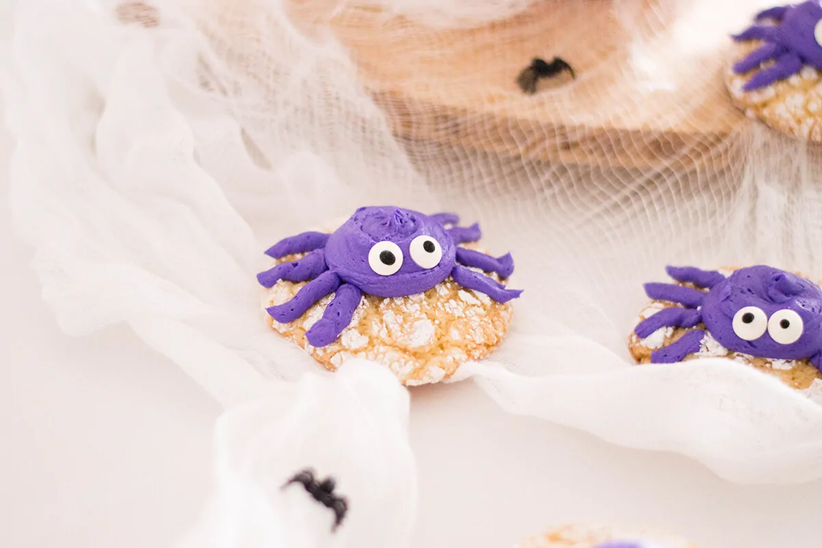 Giving our crinkle cookies a Halloween makeover with buttercream spiders.