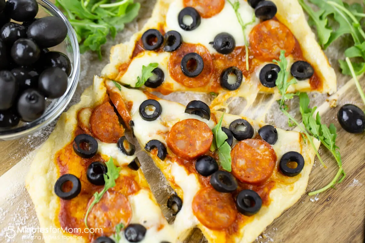 Recipe for Grilled Pizza with Hojiblanca Olives from Spain and Spanish Chorizo Sausage