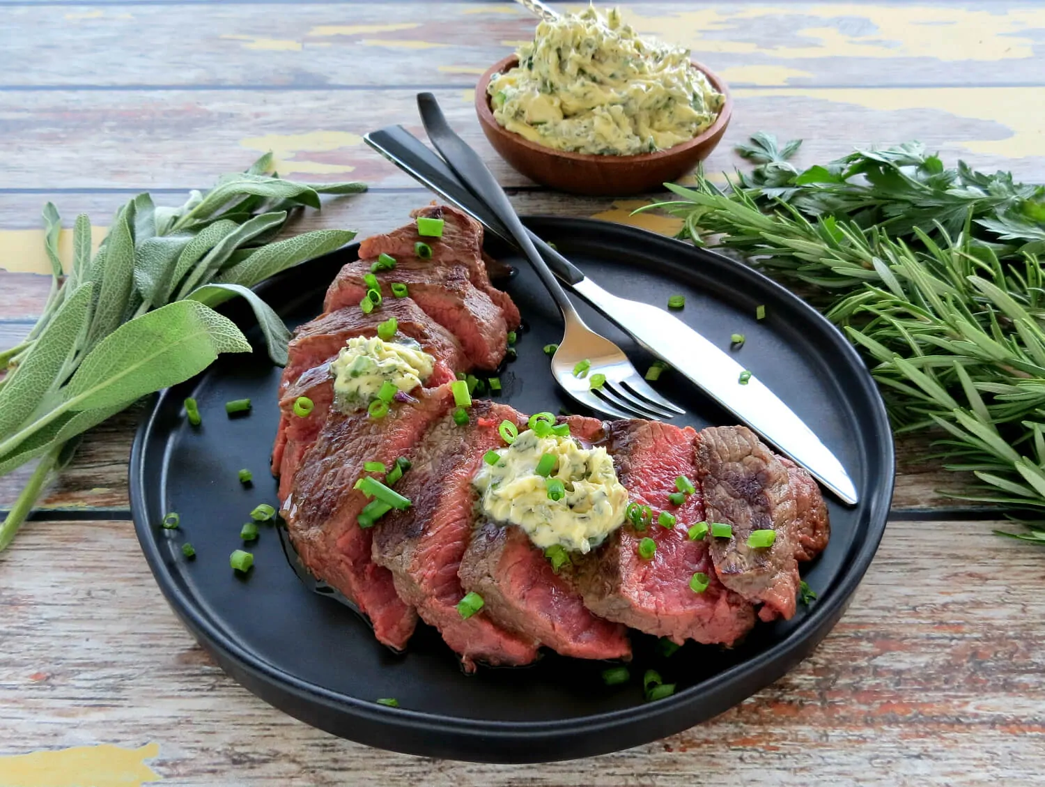 Easy Herb Butter served on Grilled Steak