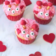 Pink, sweet, and loving monsters - here's our take on Valentine cupcakes!