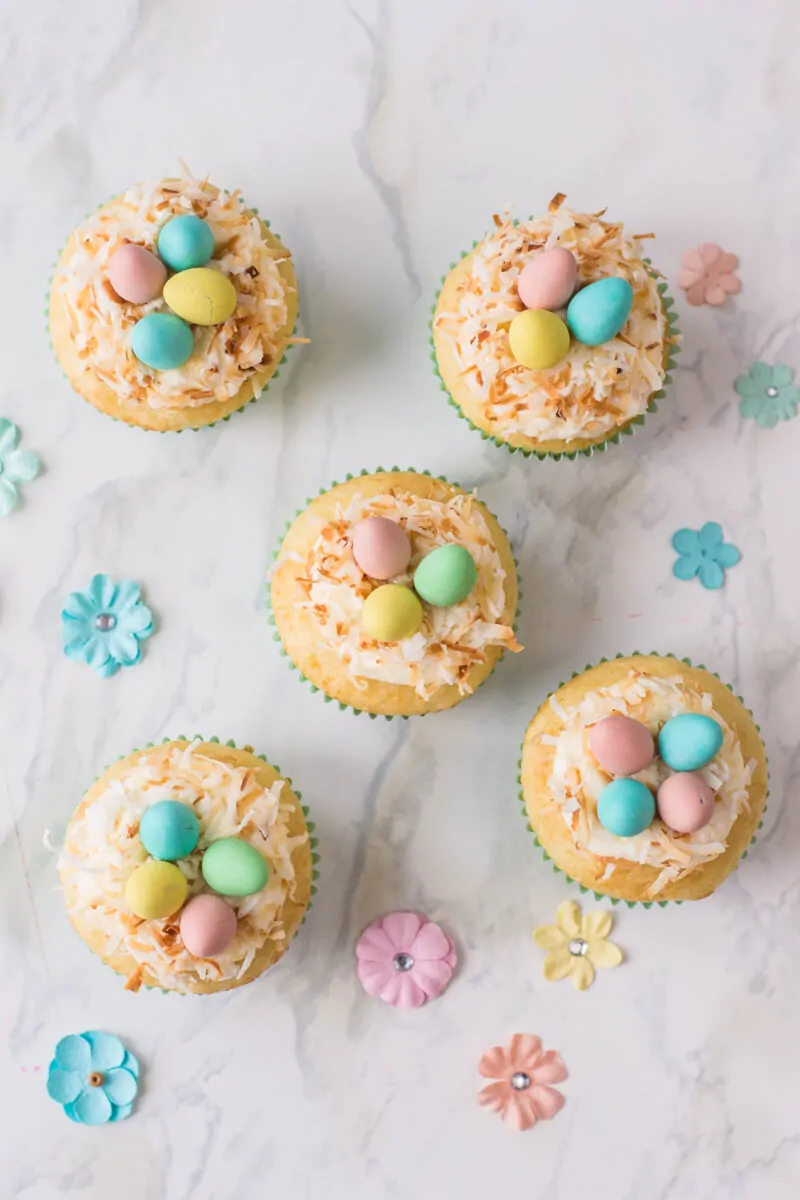 Bird's Nest Cupcakes - Vanilla cupcakes topped with buttercream, shredded coconut and candied eggs.