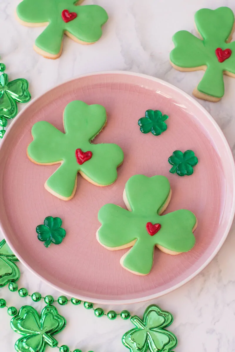 St. Patrick's Day Sugar Cookies - Lucky clovers with a frosted heart.