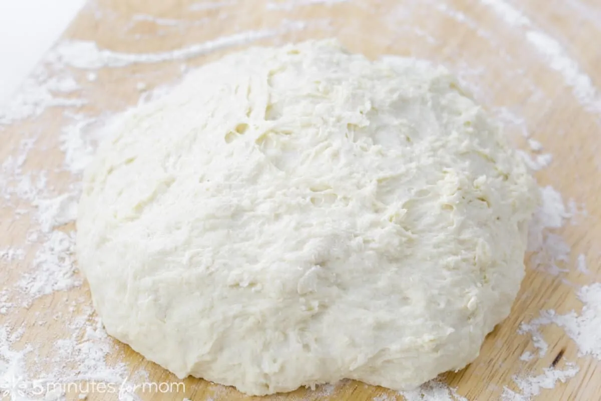 Form the dough into a smooth circle