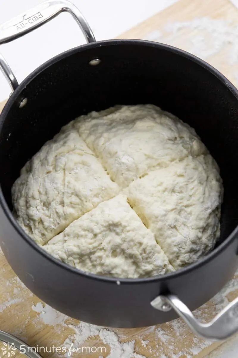 Loaf of bread in cast iron pot