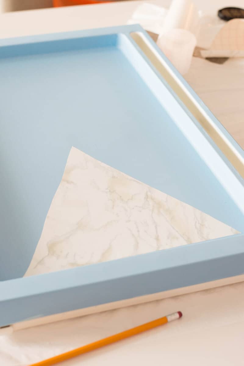 IKEA Hack - Apply marble contact paper to painted IKEA bed tray to make an easy breakfast tray DIY.