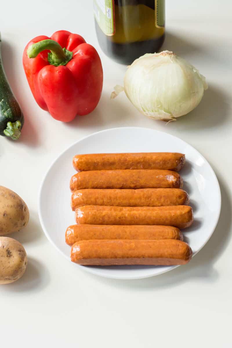 Sausage foil packets are the ideal meals to bring along your camping adventures. Follow along our easy recipe to make them for your family! #campingrecipes #foilpackets #5MinutesforMom