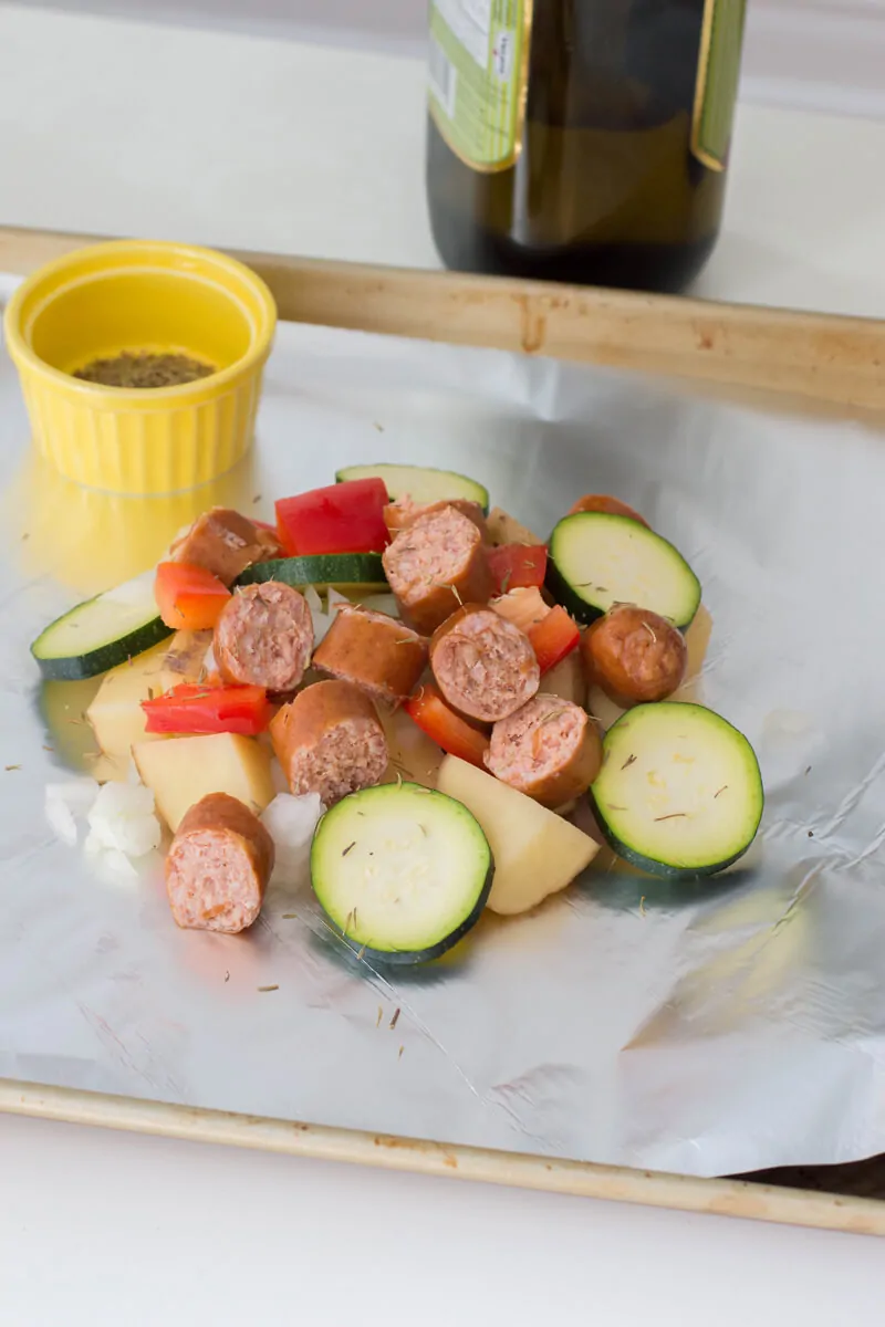 Sausage foil packets are the ideal meals to bring along your camping adventures. Follow along our easy recipe to make them for your family! #campingrecipes #foilpackets #5MinutesforMom