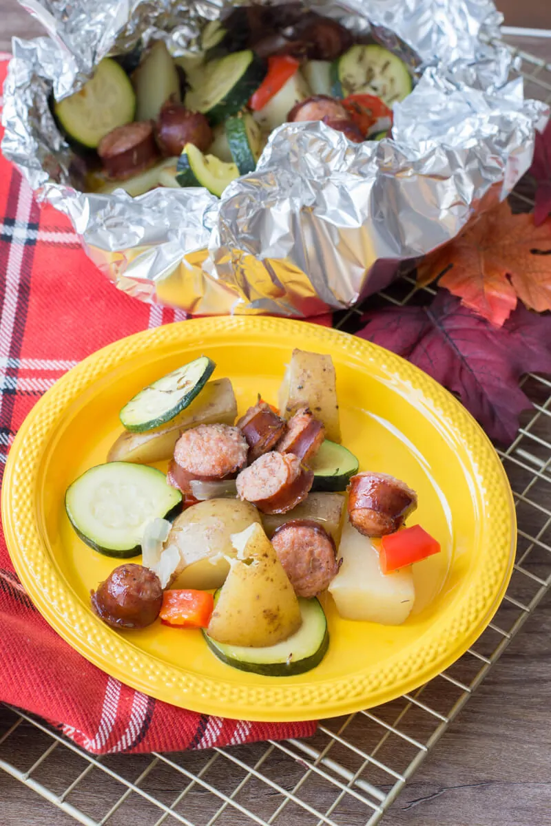 Sausage foil packets are the ideal meals to bring along your camping adventures. Follow along our easy recipe to make them for your family! #campingrecipes #foilpackets #5MinutesforMom