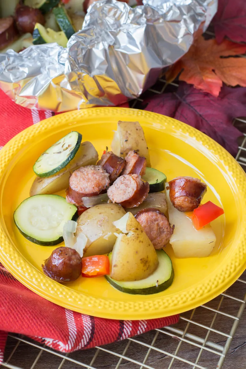 Sausage foil packets are the ideal meals to bring along your camping adventures. Follow along our easy recipe to make them for your family! #campingrecipes #foilpackets #5MinutesforMom