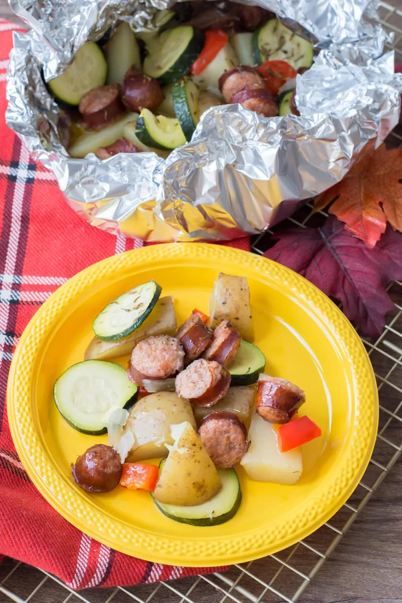 Sausage foil packets are the ideal meals to bring along your camping adventures. Follow along our easy recipe to make them for your family! #campingrecipes #foilpackets #5MinutesforMom