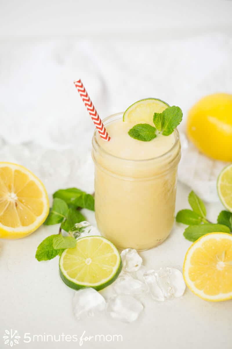 Vertical photo of Lemon Iced Tea Smoothie served in a mason jar with a straw