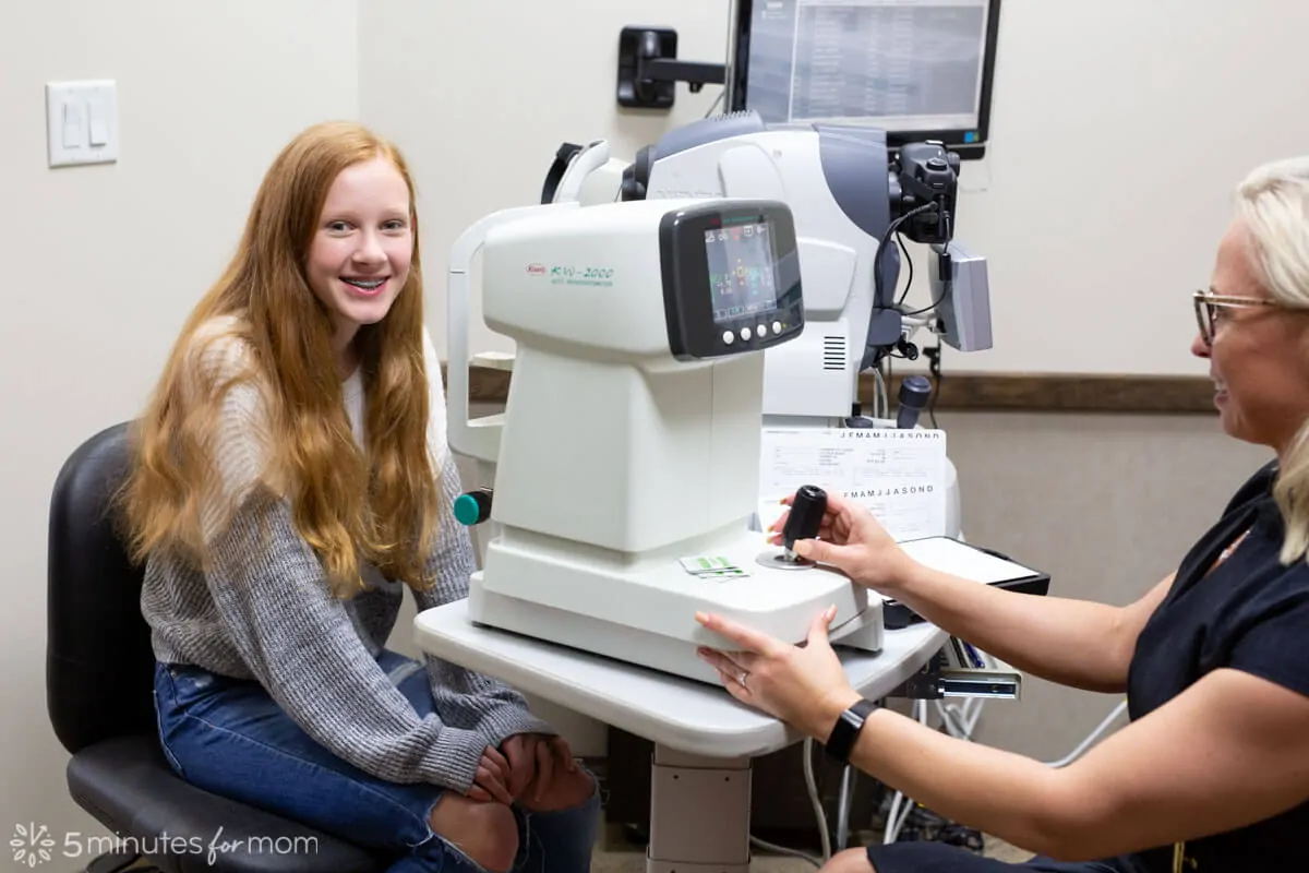 Teenager having an eye exam at an optometrist