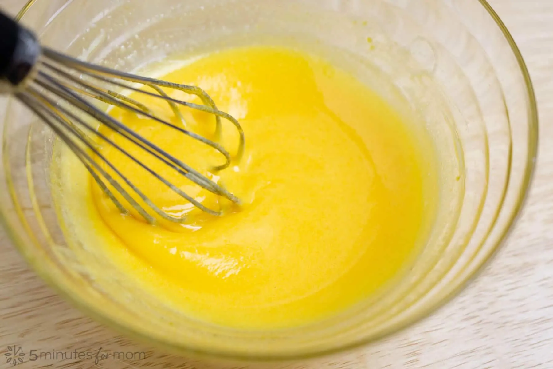 Beat eggs with whisk