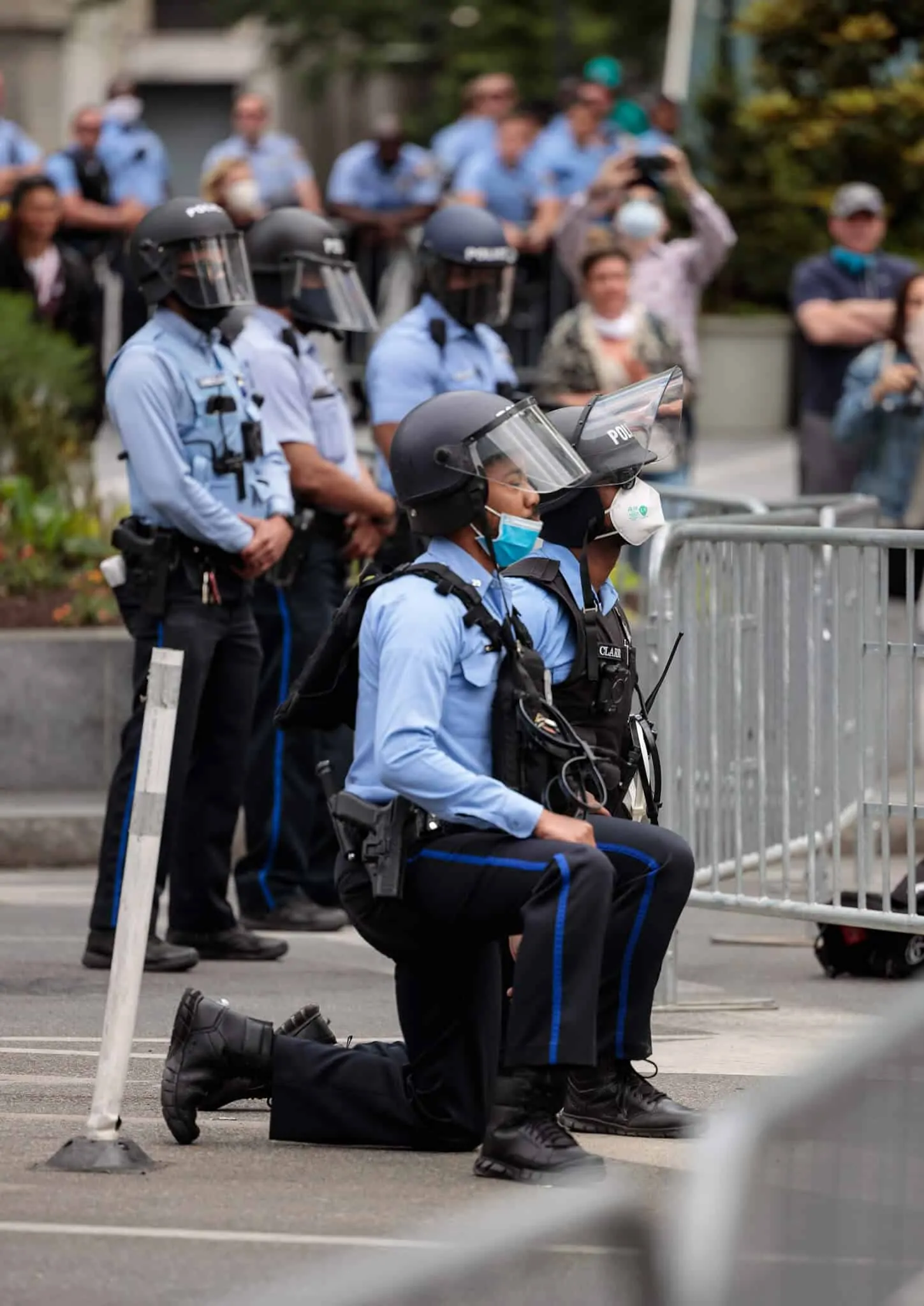 Police Taking a Knee - Photo by Rob Bulmahn