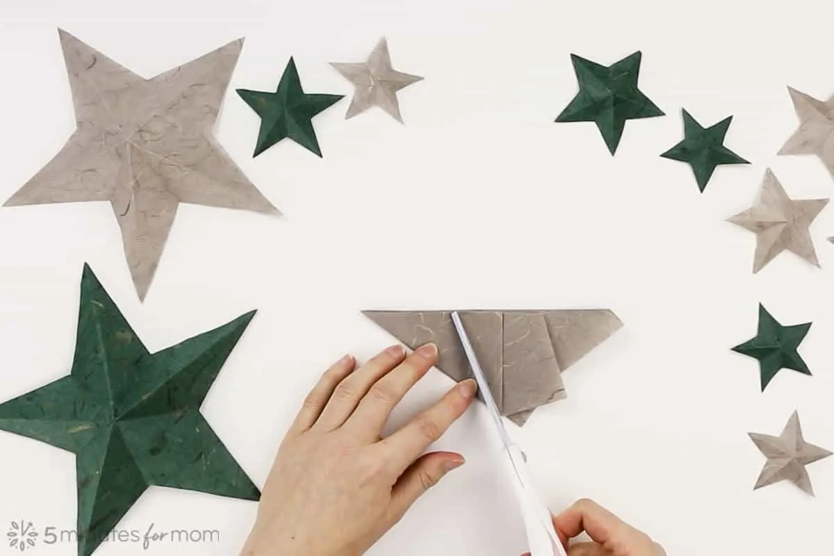 how to make an paper star how to fold a one cut paper star instructions