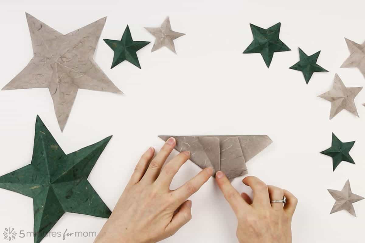 how to fold a one cut paper star instructions