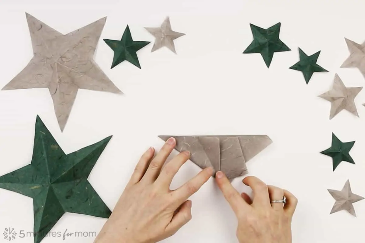 how to fold a one cut paper star instructions
