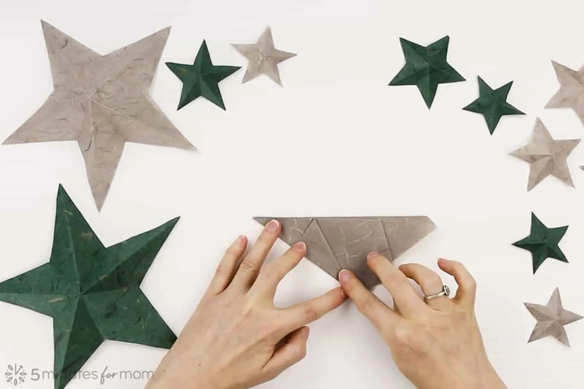 how to make an paper star how to fold a one cut paper star instructions