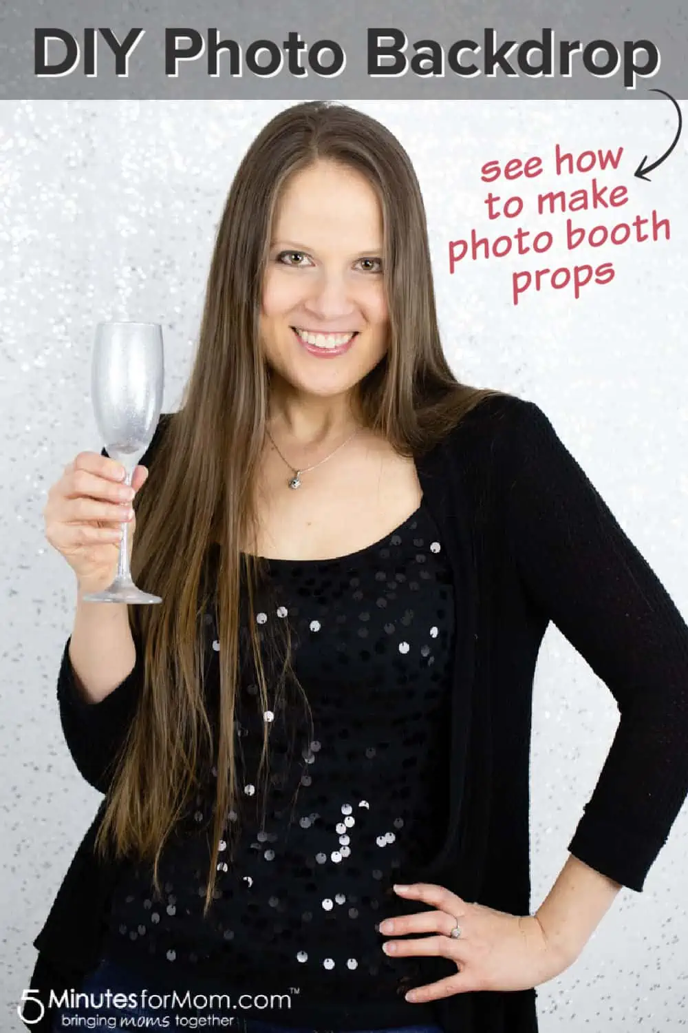 Woman with silver painted champagne glass in front of silver photo backdrop. Text overlay says DIY Photo Backdrop - See how to make photo booth props